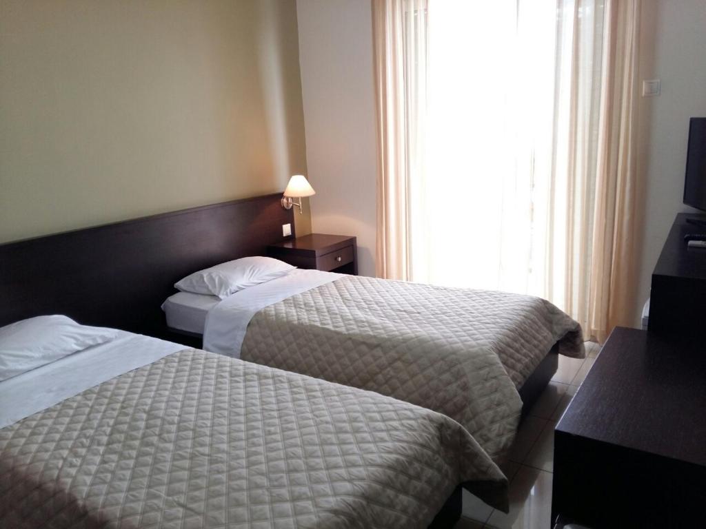 Postel nebo postele na pokoji v ubytování Tokalis Boutique Hotel & Spa