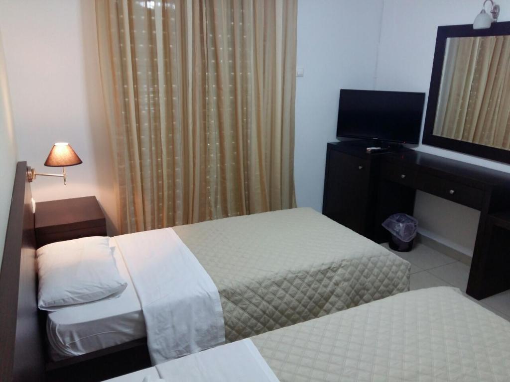 Postel nebo postele na pokoji v ubytování Tokalis Boutique Hotel & Spa