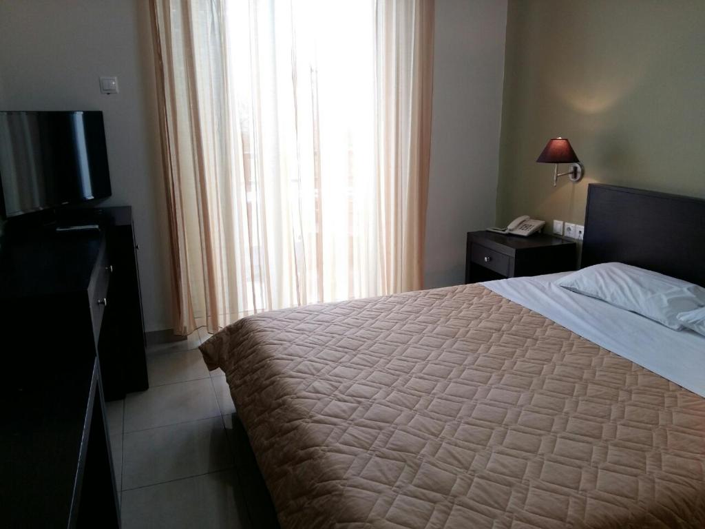 Postel nebo postele na pokoji v ubytování Tokalis Boutique Hotel & Spa