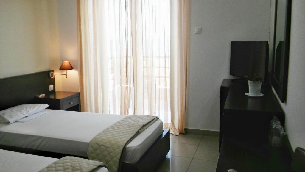 Postel nebo postele na pokoji v ubytování Tokalis Boutique Hotel & Spa