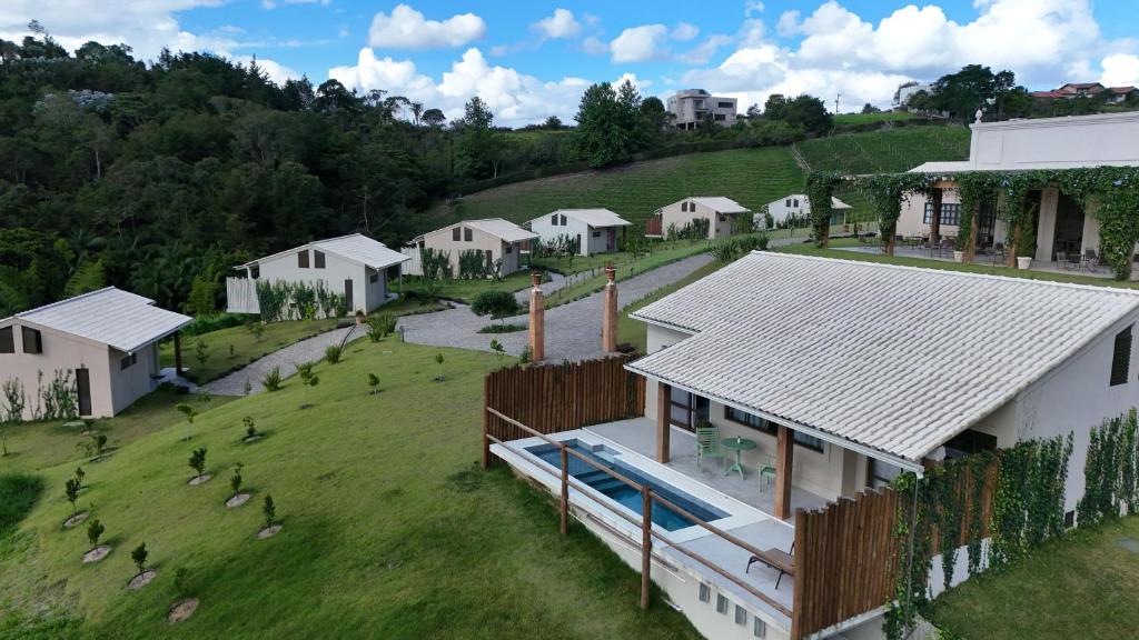 an aerial view of a house with a yard at Quinta dos Manacás Pousada e Restaurante in Pedra Azul