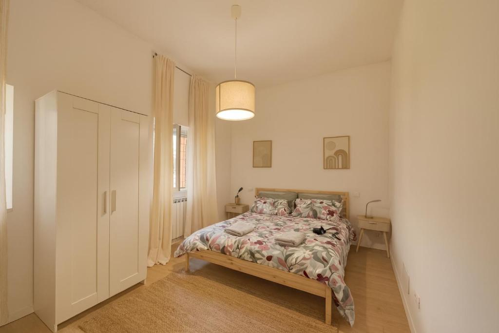 a bedroom with a bed in a room at La Casa del Borgo in Rieti