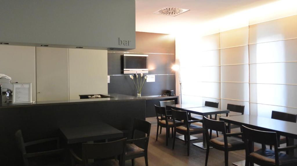 Kuchyň nebo kuchyňský kout v ubytování Hotel Corallo