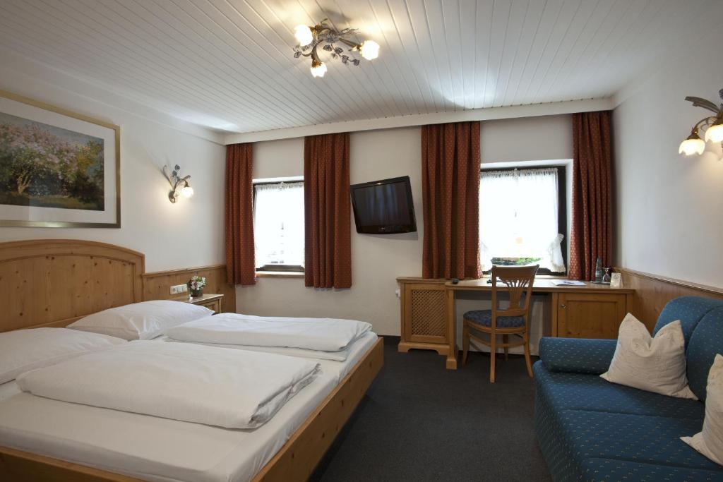 Postel nebo postele na pokoji v ubytování Hotel zur Mühle