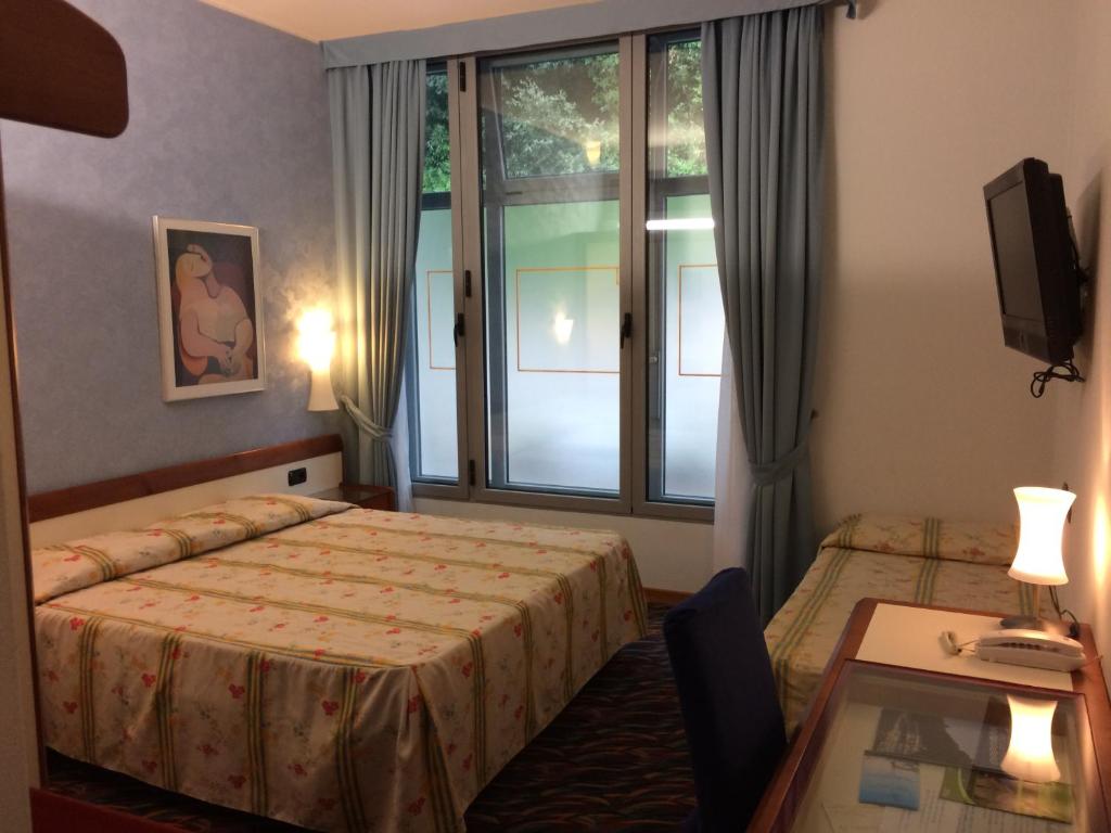 Krevet ili kreveti u jedinici u objektu Hotel San Terenzo