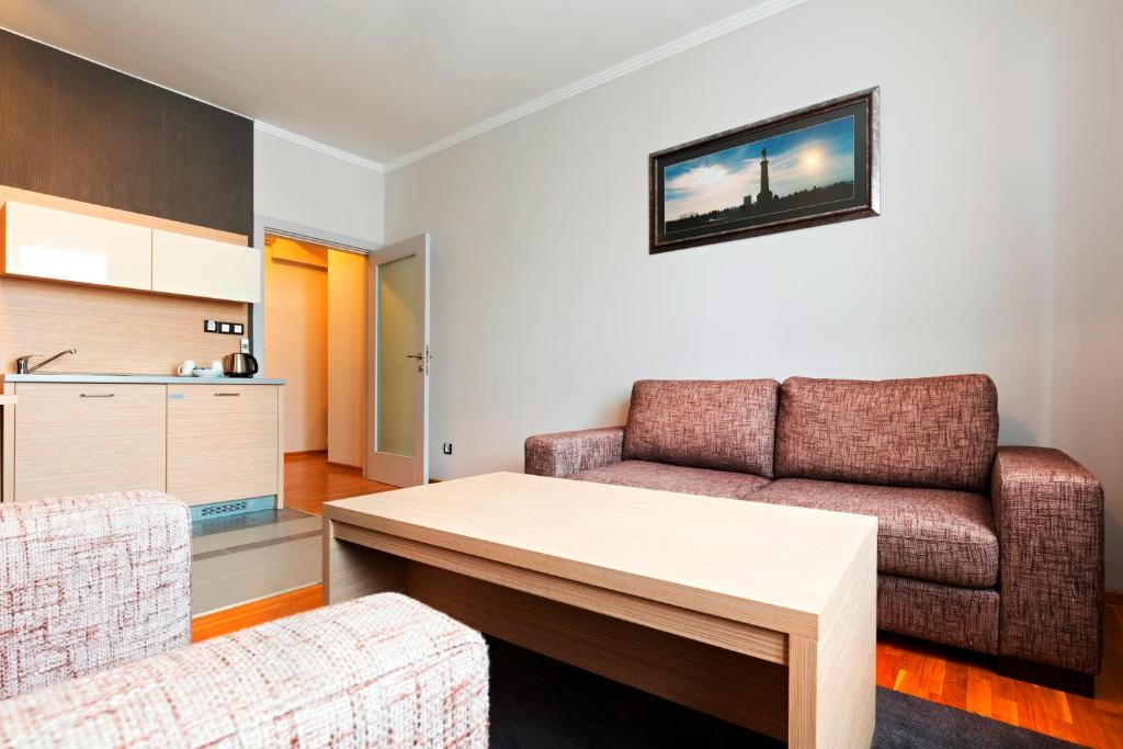 Kuchyň nebo kuchyňský kout v ubytování Garni Hotel Nevski