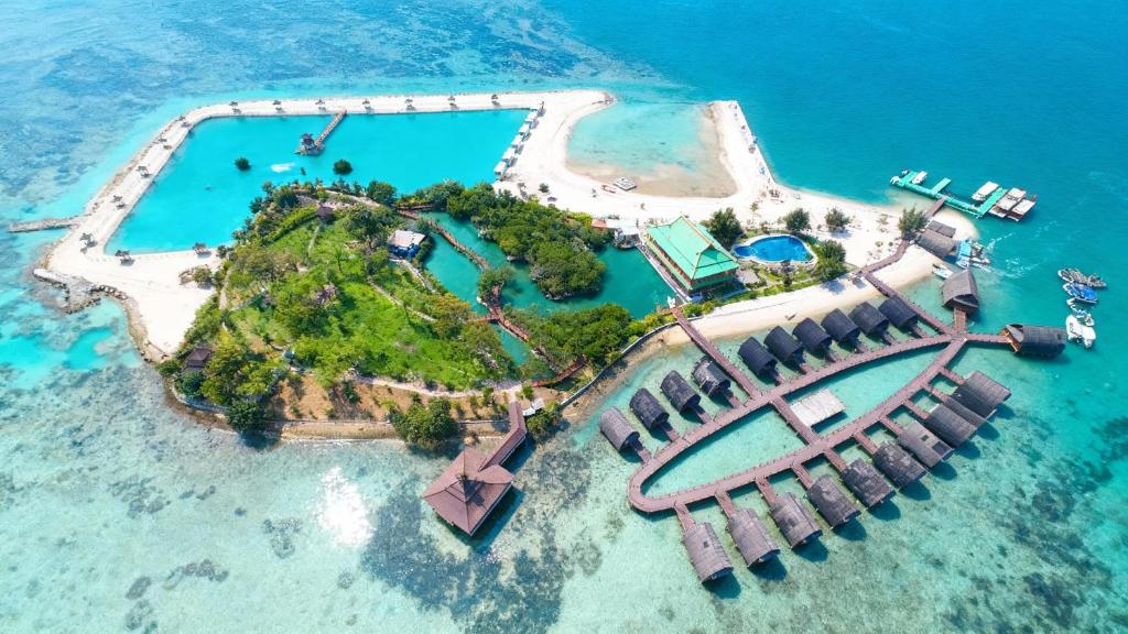 an island in the ocean with a water park at PULAU LIMA Resort in Serang