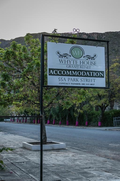 a sign for the writtle houseampire refuge association at The Whyte House in Graaff-Reinet