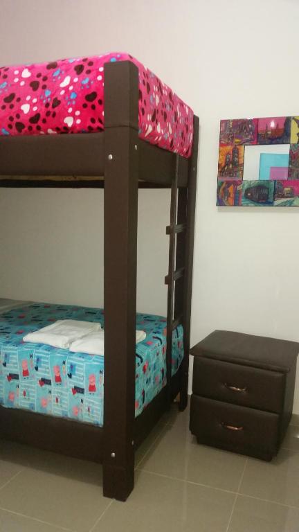 Postel nebo postele na pokoji v ubytování Hostal Johnnier Macao Punta Cana