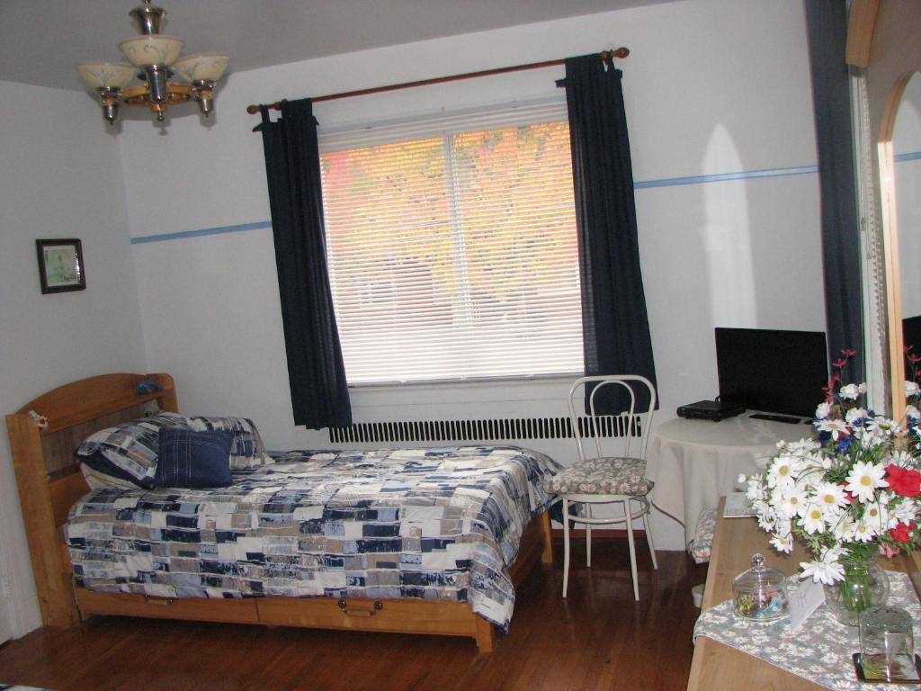 Postel nebo postele na pokoji v ubytování Magnolia B&B