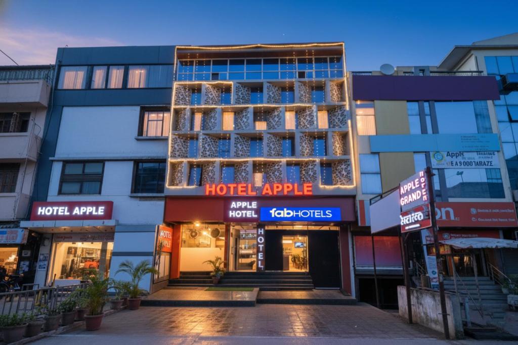 a hotel apartment building in the middle of a street at FabHotel Apple Near ITI in Indore