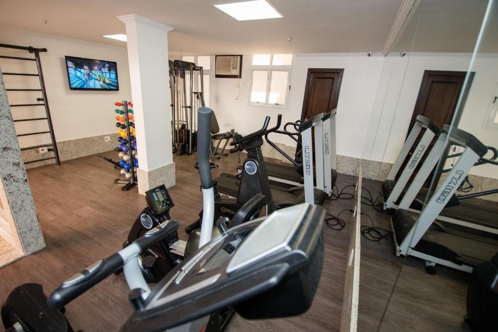 a gym with several exercise bikes in a room at Hotel OK in Rio de Janeiro