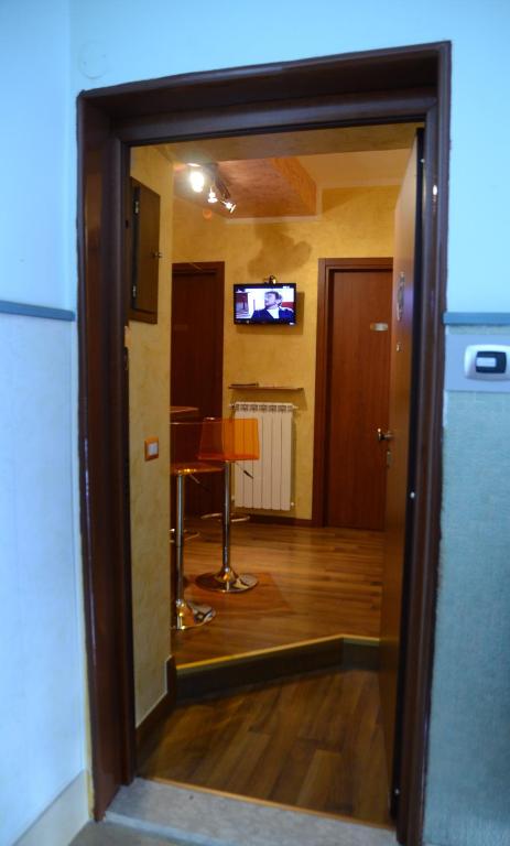 TV a/nebo společenská místnost v ubytování B&B Le Stagioni