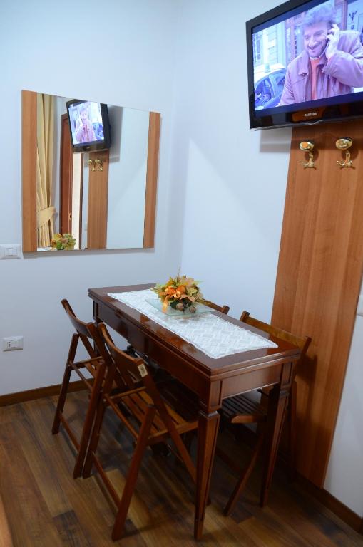 TV a/nebo společenská místnost v ubytování B&B Le Stagioni