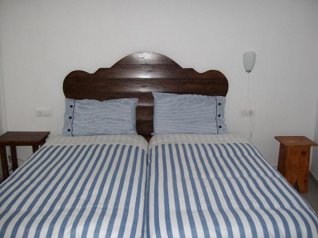 Postel nebo postele na pokoji v ubytování Apartments Luna 19