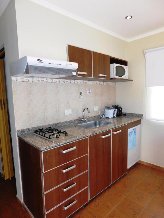 Kuchyň nebo kuchyňský kout v ubytování Terra Apart Hotel