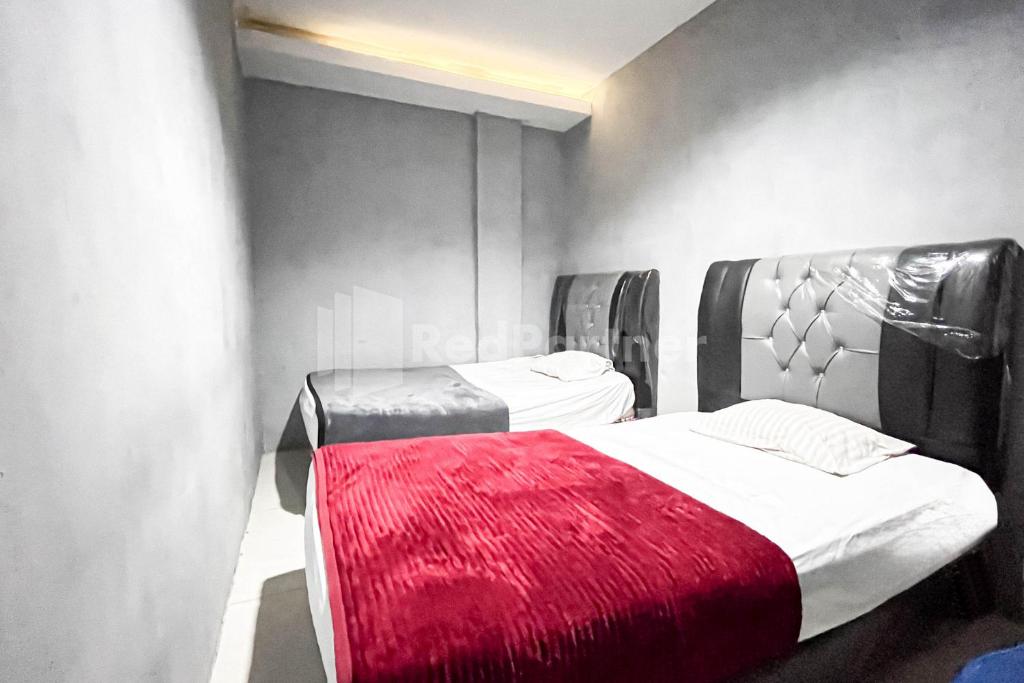Golden Ritz Homestay Medan Mitra RedDoorz - غرفة توأم قياسية