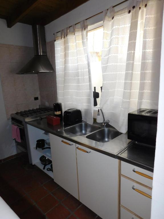 Kuchyň nebo kuchyňský kout v ubytování Terra Apart Hotel