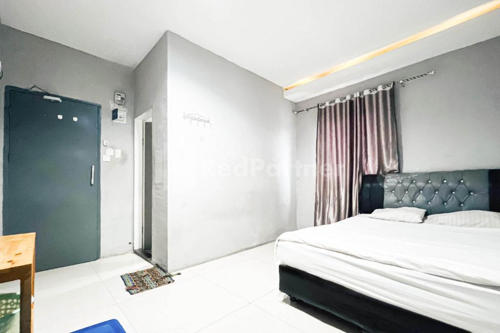 Golden Ritz Homestay Medan Mitra RedDoorz - غرفة قياسية مزدوجة