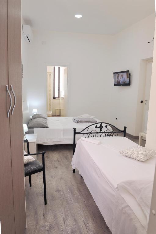 Postel nebo postele na pokoji v ubytování B&B Rosy