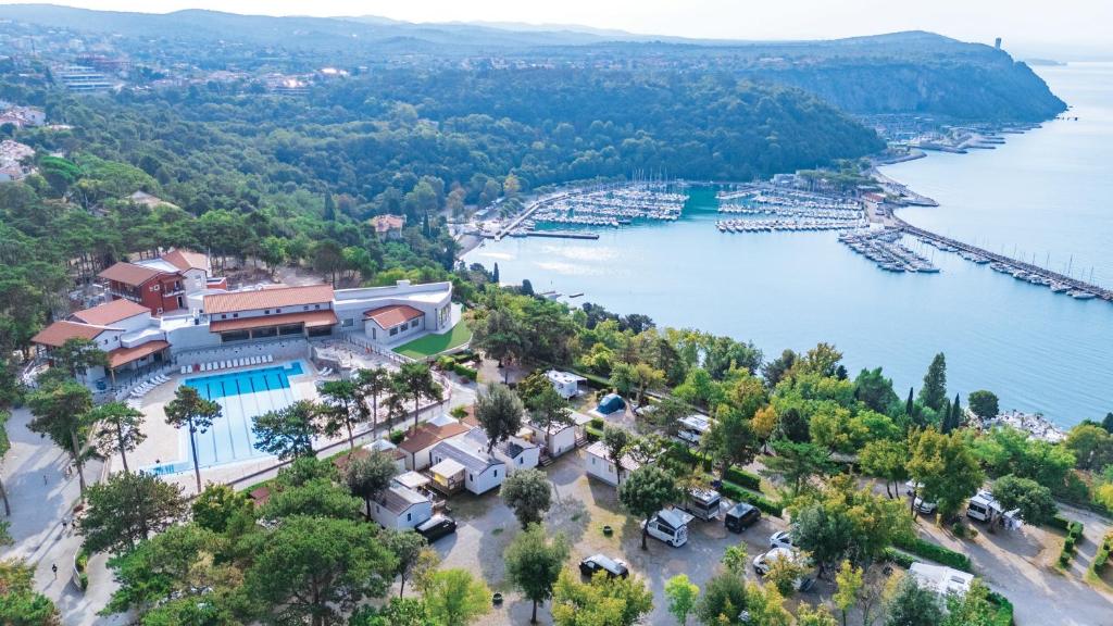 an aerial view of a town next to a body of water at Glamping Sistiani in Lido di Spina