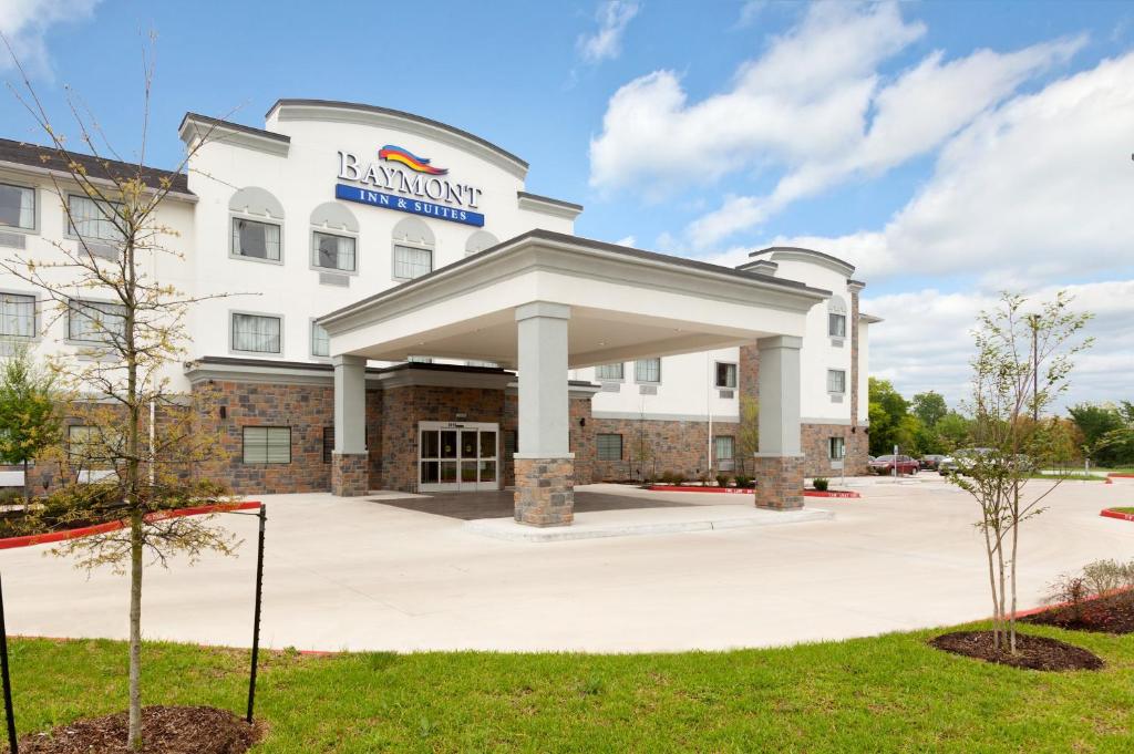 a rendering of the front of a hotel at Baymont by Wyndham College Station in College Station