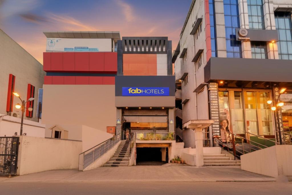 a building with a ted works sign on it at FabHotel White Ridge Chaitanyapuri in Hyderabad