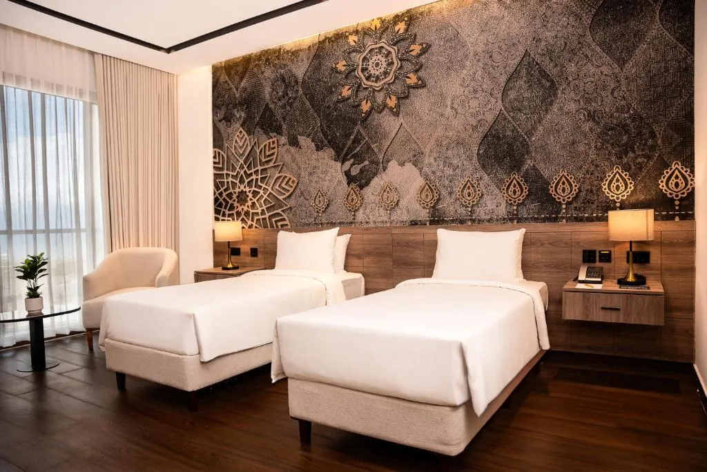 Deluxe Room Pool View with Balcony – 2 Single Beds
