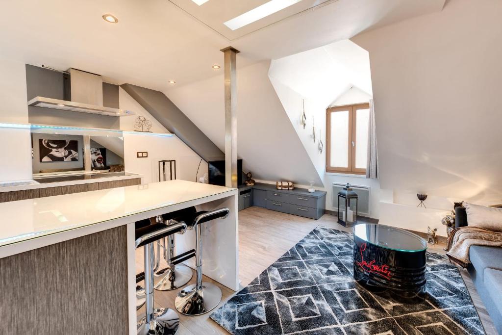 Le Duplex atypique superbe coeur centre ville