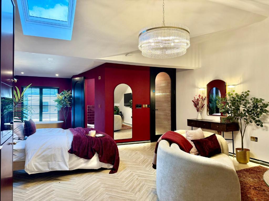 a large bedroom with a large bed and a couch at Hylton House in Birmingham