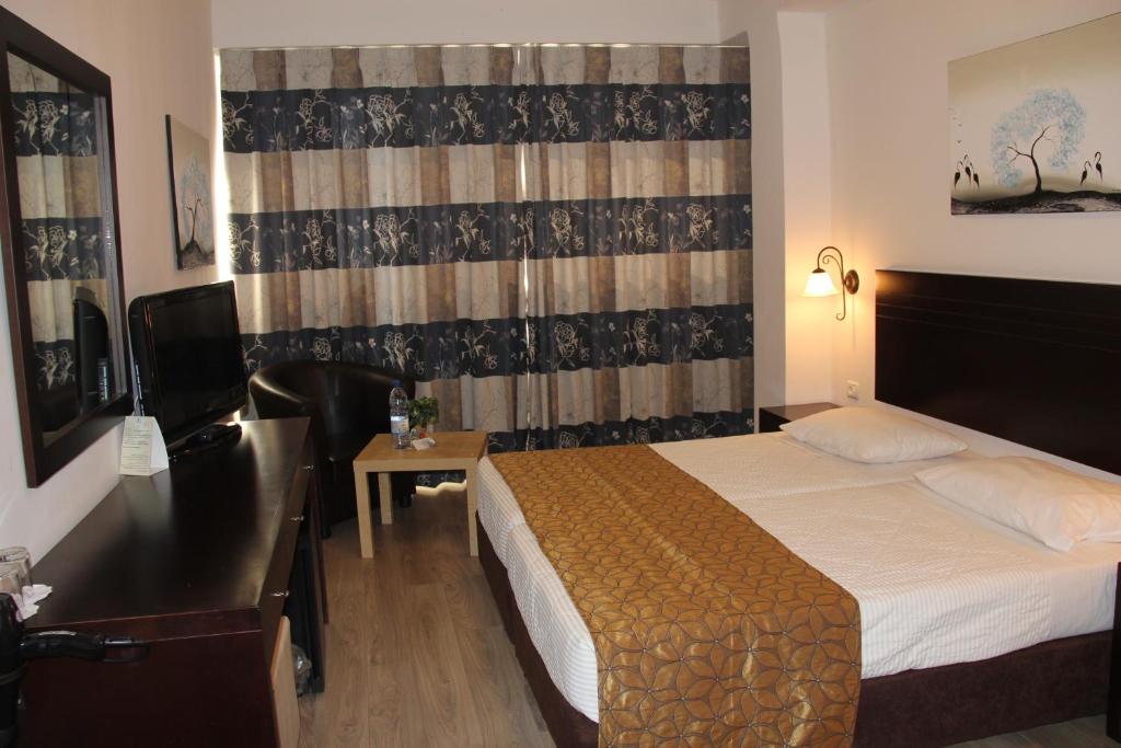Postel nebo postele na pokoji v ubytování Restal Hotel