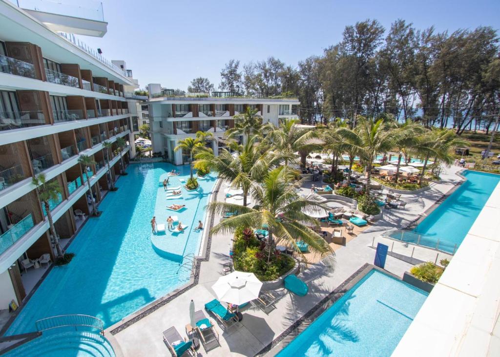 an aerial view of the pool at the resort at Beachfront 267 3BR Condo with Pool View in Phuket