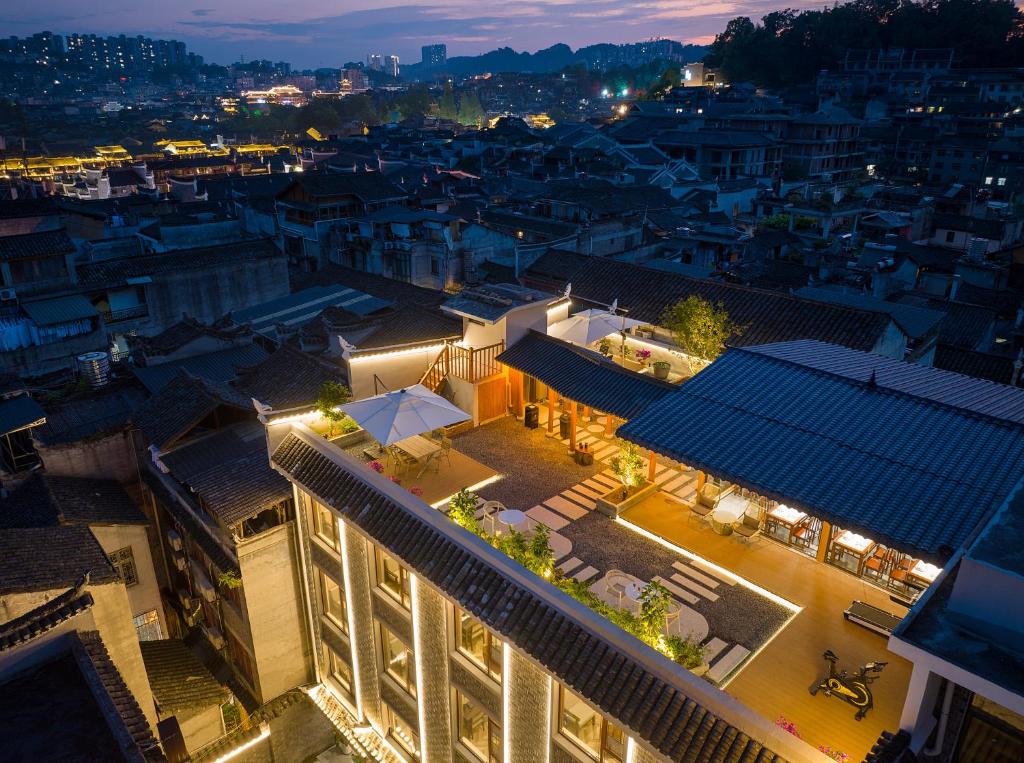 an overhead view of a city at night at Fenghuang Story Hotel in Fenghuang County