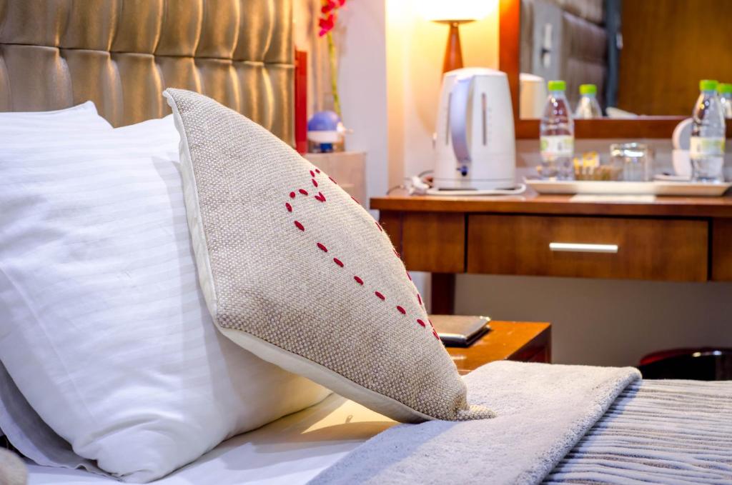 Postel nebo postele na pokoji v ubytování Newtown Inn