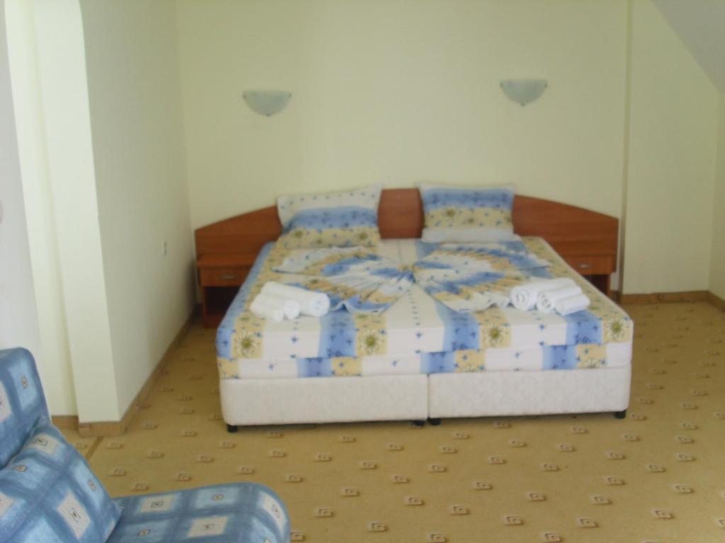 Postel nebo postele na pokoji v ubytování Hotel Varvara