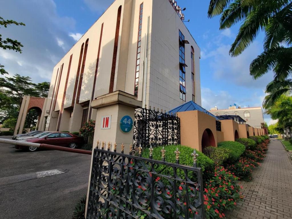 a building with a gate in front of it at Valencia Hotels Abuja in Abuja