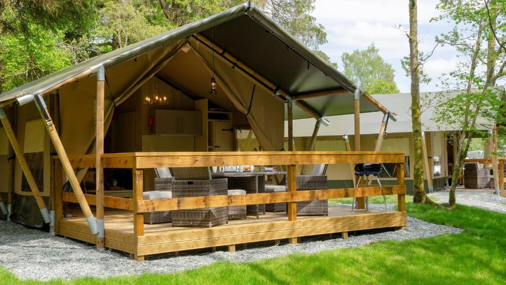 a large gazebo with a black roof at Blencathra - Safari Tent in Ambleside