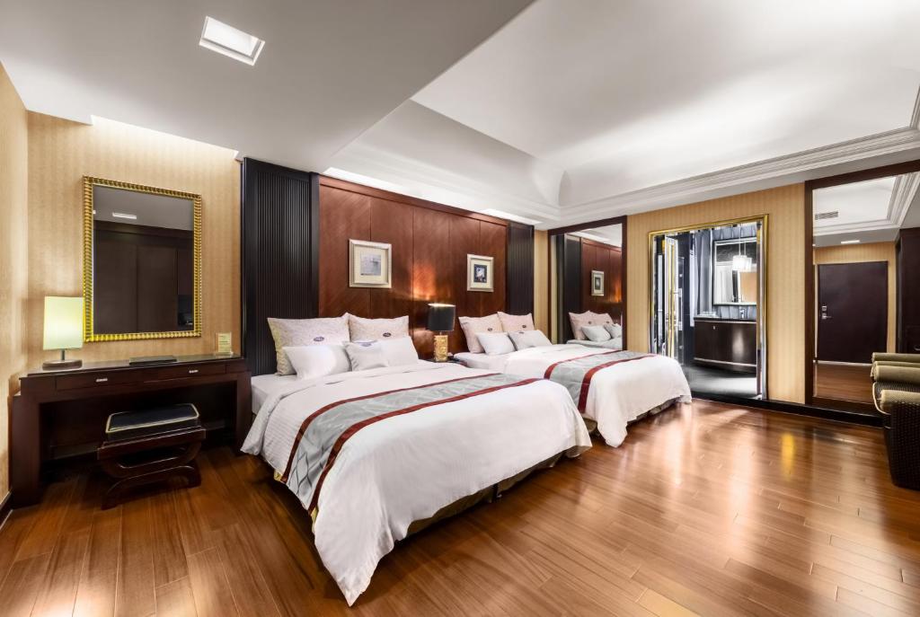 Postel nebo postele na pokoji v ubytování Chuang-Tang Spring SPA Hotel - Deyang