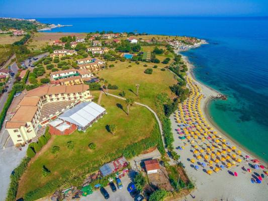 an aerial view of a beach with umbrellas and the ocean at Fruit Village Tropea Baia della Rocchetta Soft all Inclusive in Conidoni