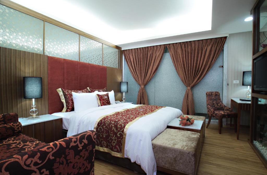 Postel nebo postele na pokoji v ubytování Chuang-Tang Spring SPA Hotel - Deyang