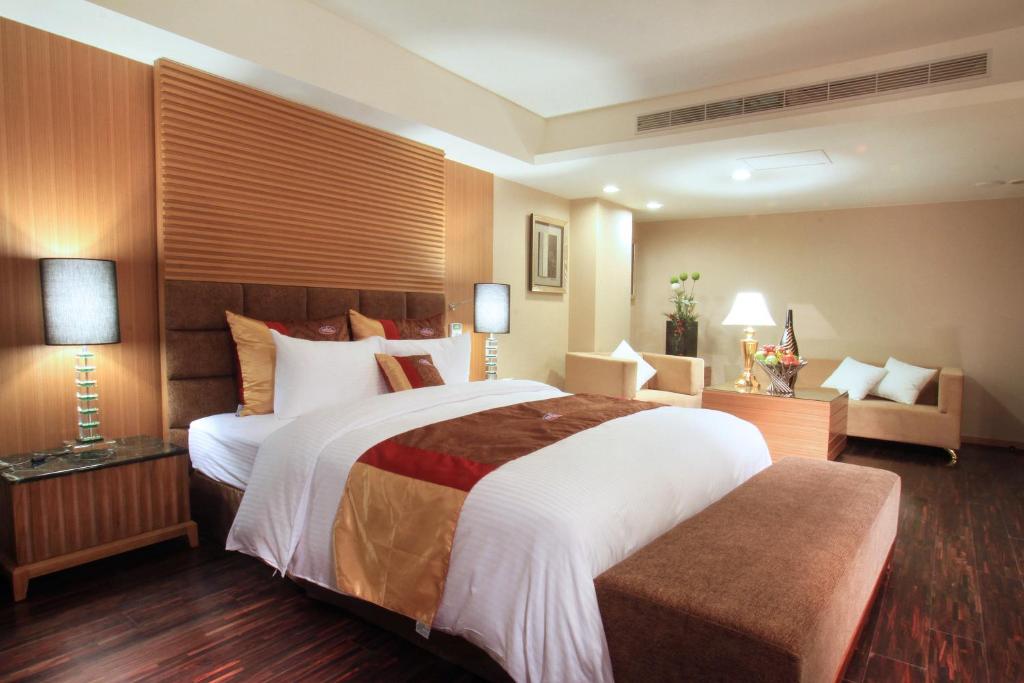 Postel nebo postele na pokoji v ubytování Chuang-Tang Spring SPA Hotel - Deyang