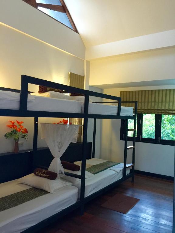 Letto o letti in una camera di Phitharom PP Resort