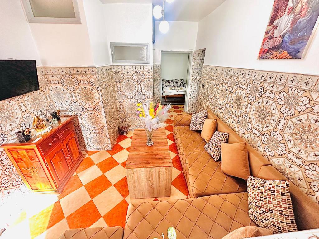 a living room with a couch and a table at Apartment with 2 bedrooms in Essaouira