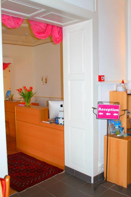 Postel nebo postele na pokoji v ubytování BasicRooms Hotel