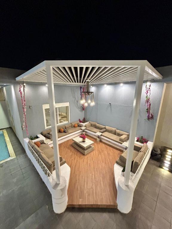 an overhead view of a living room with couches at IN 2 Chalet in Jeddah