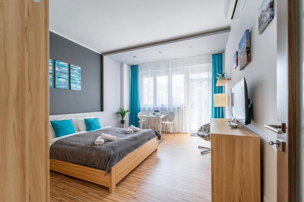 Llit o llits en una habitació de Régiposta Studio