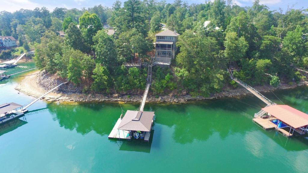 an aerial view of a gondola crossing a river at Central Perk - Pet Friendly, Luxury Cabin Feel, Kayaksand Coffee! in Crane Hill