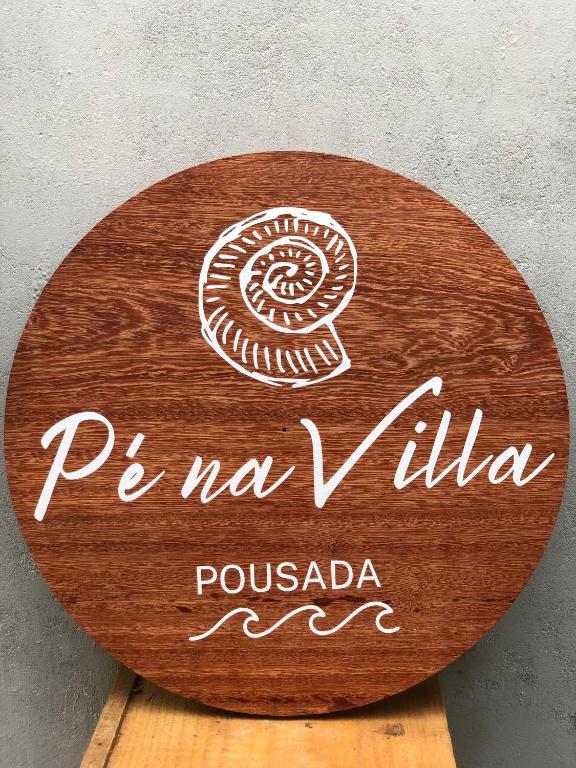 a wooden sign that reads ponte novalla porosoda at Pé na Villa in Itacaré