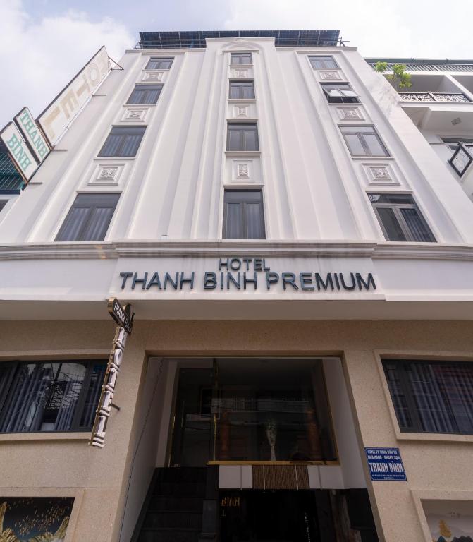 a building with a sign that reads thank birmingham firm at Thanh Binh Premium Hotel in Ho Chi Minh City