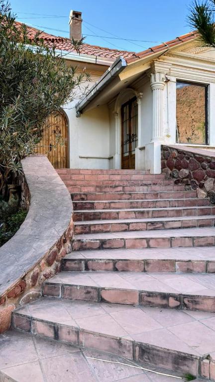 a set of stairs in front of a house at The Baron House in Tupiza